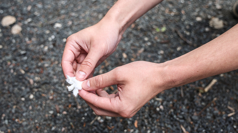 Hand's exposing or opening up Coghlan's Tinder fiber